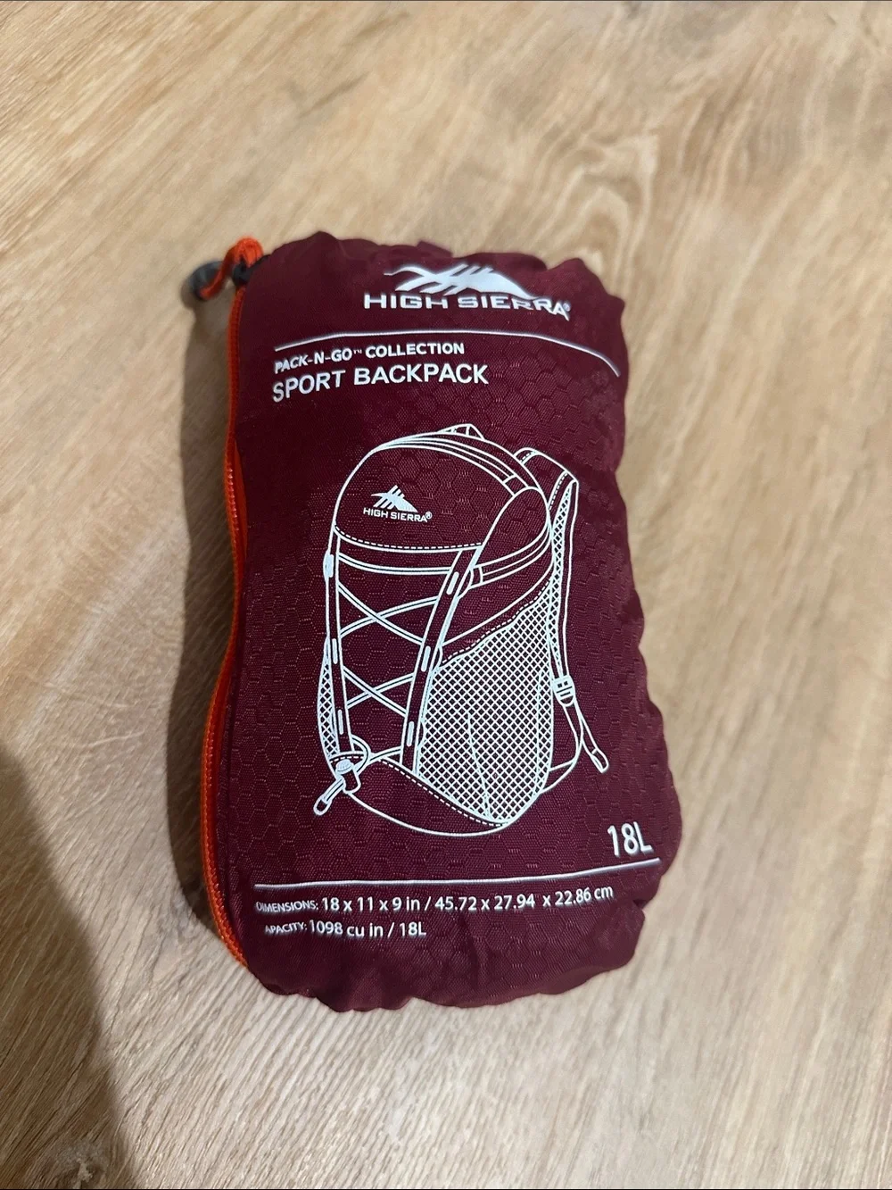 High Sierra Maroon Pack with Orange Trim 18L Pack-N-Go Sport Backpack